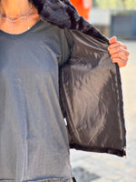 Load image into Gallery viewer, NAIA Sleeveless Vest Black
